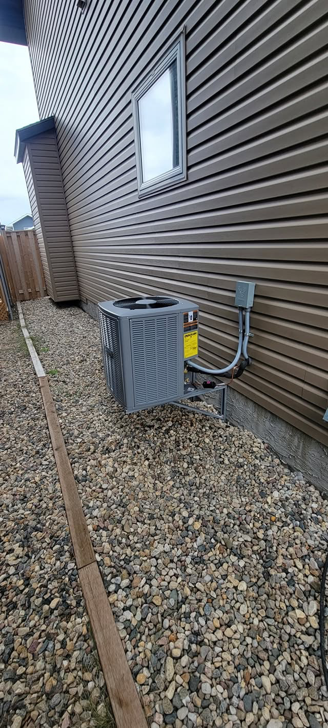 Central air conditioner condenser installed by Penberg Mechanical