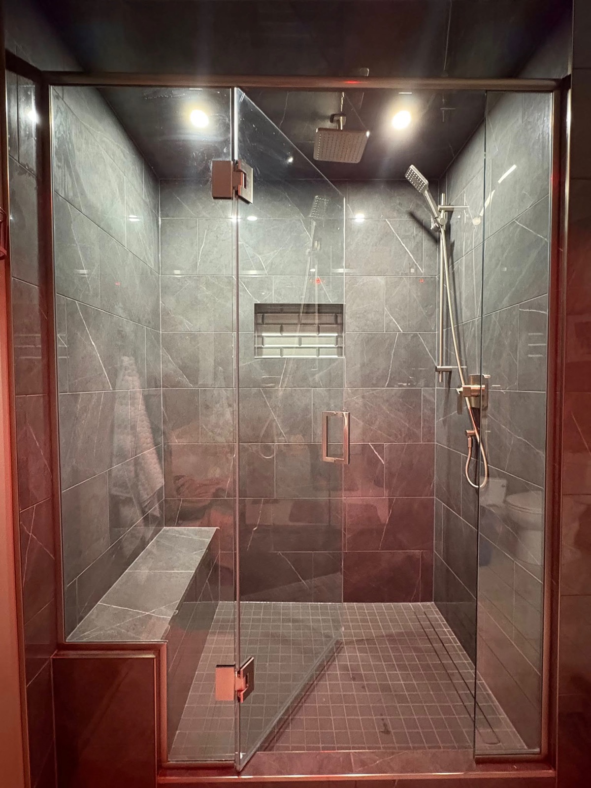 Custom glass steam shower installed by Penberg Mechanical
